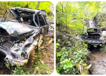 Autoturism căzut într-o râpă