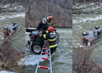 Defileul Jiului: un preot și o măicuță, salvați din mașina răsturnată în apele învolburate ale Jiului