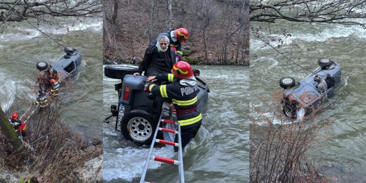 Defileul Jiului: un preot și o măicuță, salvați din mașina răsturnată în apele învolburate ale Jiului