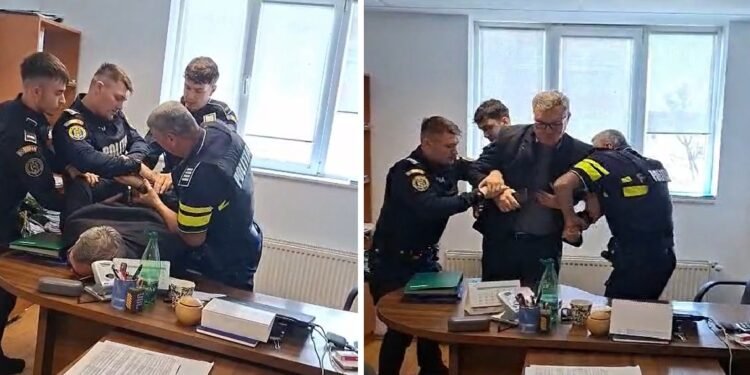 Șef scos în cătușe dintr-o instituție publică