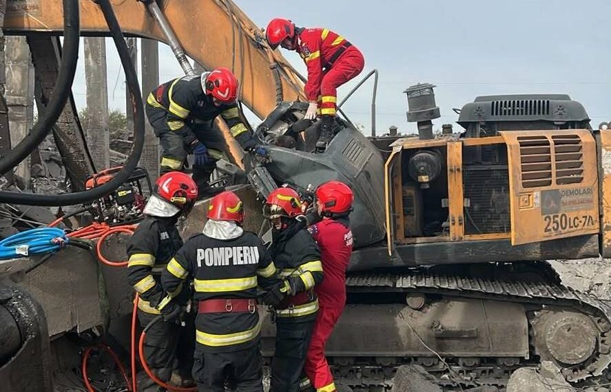 Muncitor strivit sub a grindă de beton